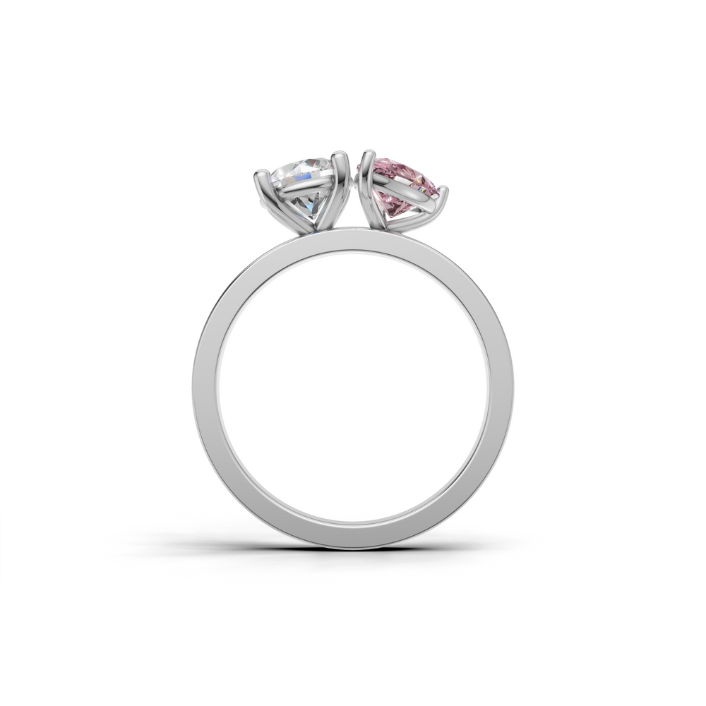 Ring featuring a unique design with two prominent gemstones