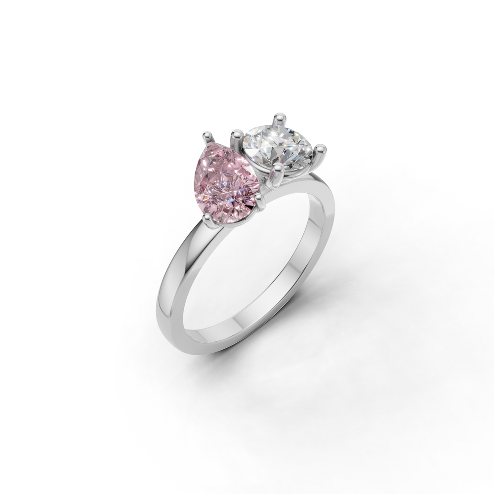 Ring featuring a unique design with two prominent gemstones