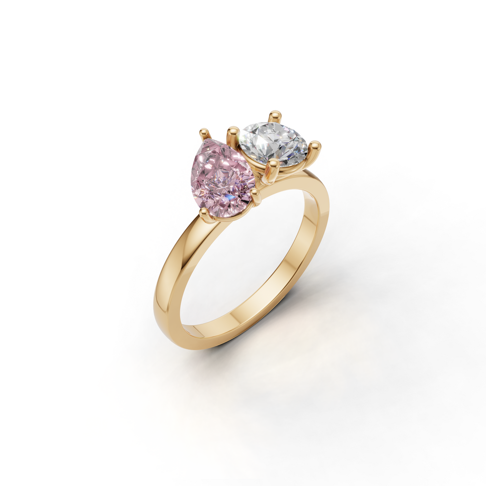 Ring featuring a unique design with two prominent gemstones
