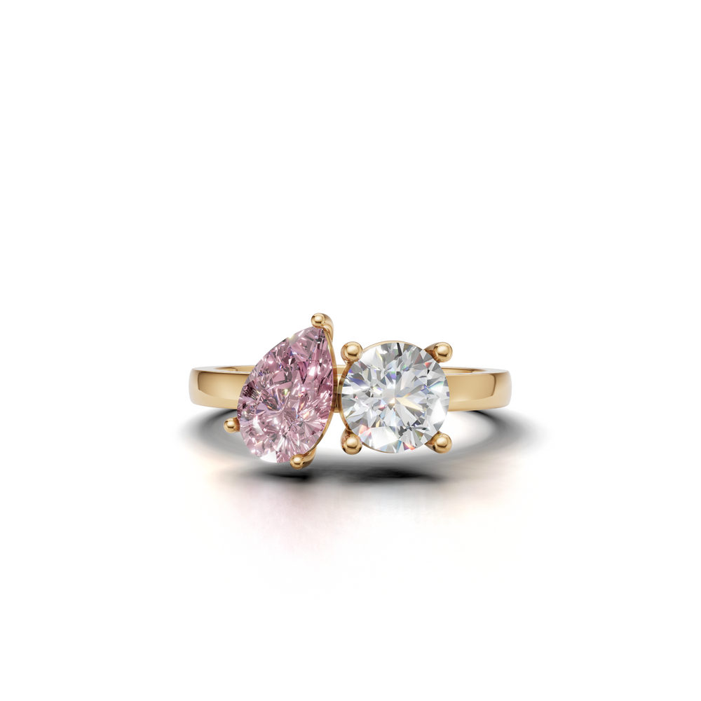 Ring featuring a unique design with two prominent gemstones